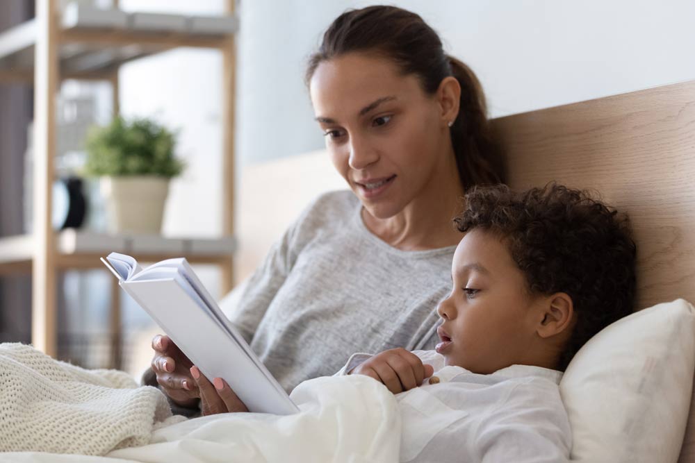 Mother Reading To Son